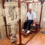 Man on an invention at the Da Vinci Museum