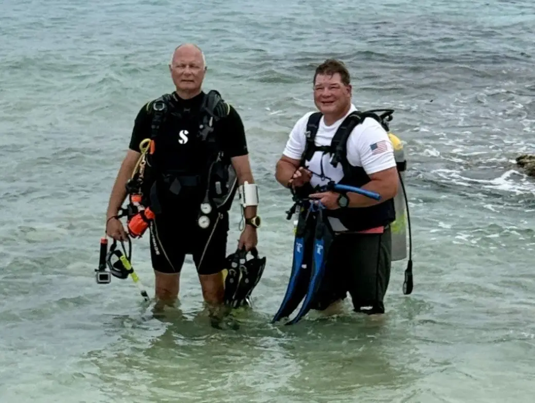 Two men scuba diving in Cozumel