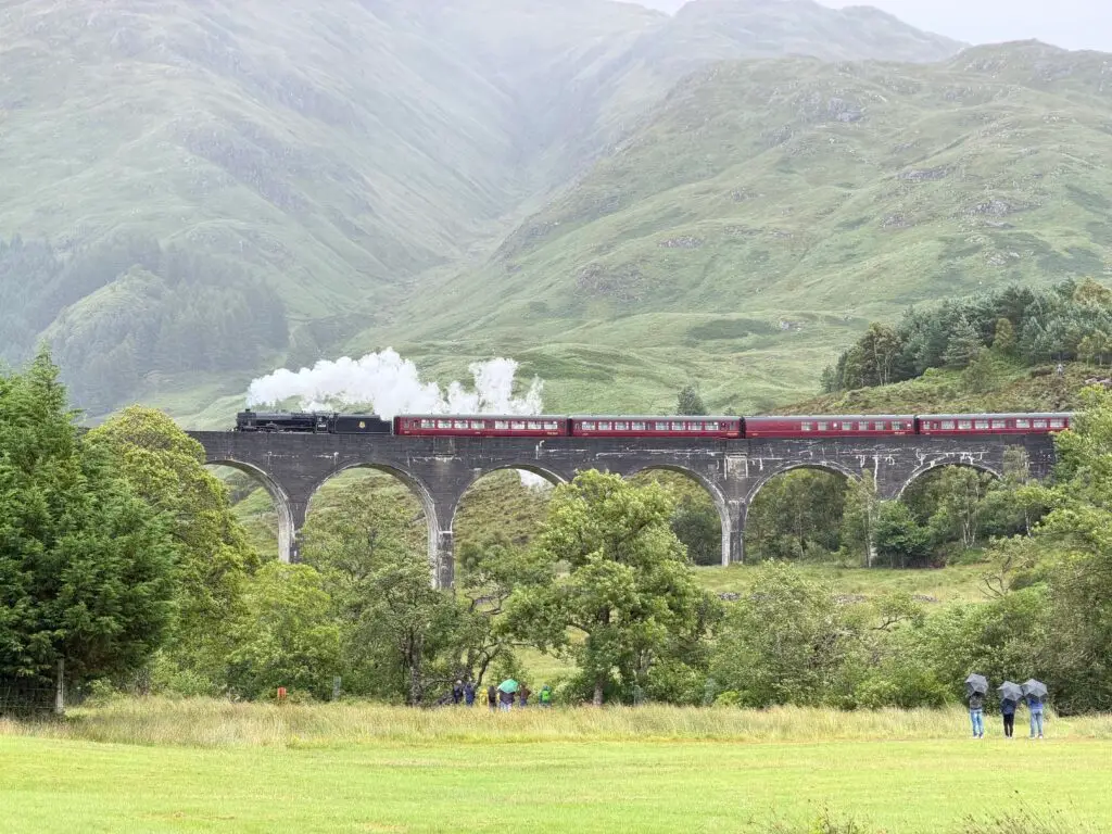 Jacobite Steam Locomotive crossing Glenfinnan Viaduct