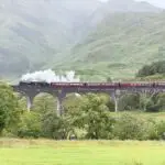 Jacobite Steam Locomotive crossing Glenfinnan Viaduct